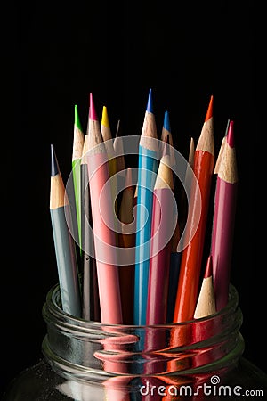 Jar of colored pencils Stock Photo