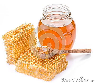 Jar full of fresh honey and honeycombs. Stock Photo