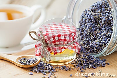 Jar of honey, dry healthy lavender tea and tea cup Stock Photo