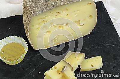 jar with honey and seasoned cheese Stock Photo