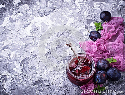 Jar with plum jam Stock Photo