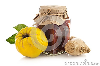 Jar of quince jam with fresh quince fruit and ginger Stock Photo