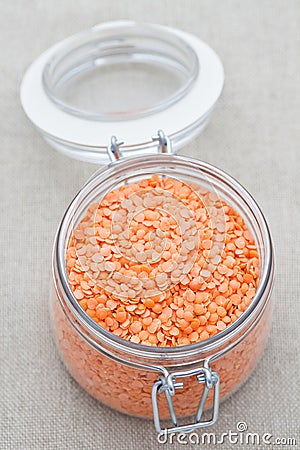 Jar of red split lentils Stock Photo