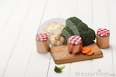 Jars of baby food with broccoli Stock Photo