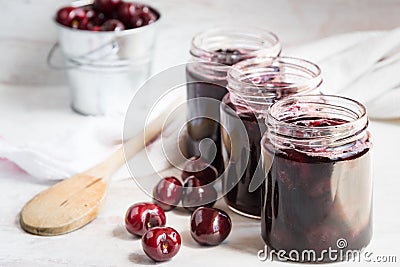 Jars with freshly homemade cherry jam Stock Photo