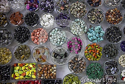 Jars full of colored beads Stock Photo