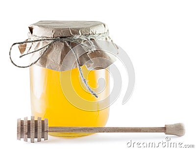 Jars of honey and wooden stick Stock Photo