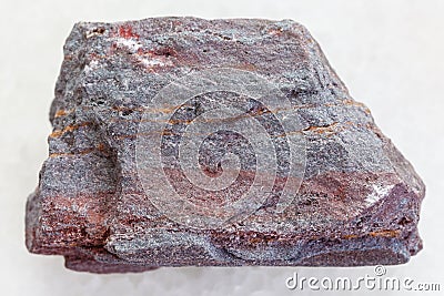 jaspilite (ferruginous quartzite) stone on white Stock Photo