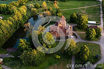 Jaunmoku brick medieval castle and its territory near Tukums, Latvia, drone view Stock Photo