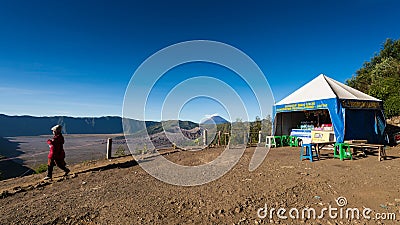 Tourists hiking to viewpoint on Mount Penanjakan,The best views from Mount Bromo to the Sand Sea below Editorial Stock Photo