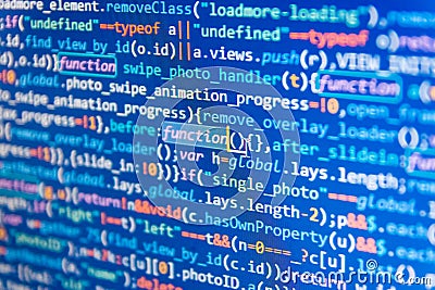 Javascript code in bracket software. Programmer typing new lines of HTML code. Stock Photo