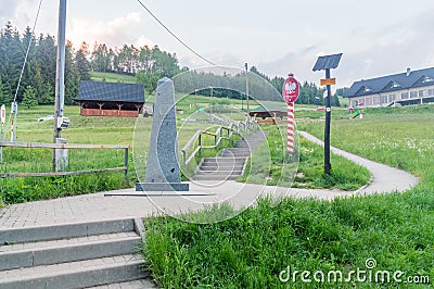 View on Polish border signs on Polish site of tripoint of Slovak, Czech, and Poland. Border of three countries Editorial Stock Photo