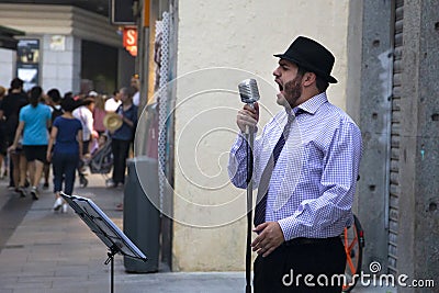 Jazz/blues musician and singer in the black hat on the one of ma Editorial Stock Photo