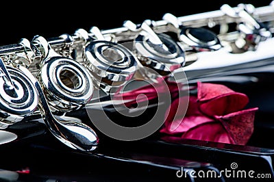 Jazz music instrument flute close up with flower Stock Photo