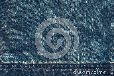 Jeans pattern background, worn denim material texture Stock Photo