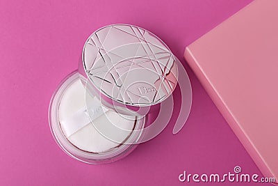 Jeddah Saudi Arabia March 31 2021 Dior cosmetics scent concept. Cream bottle with background Flat lay and copy space top view. Editorial Stock Photo