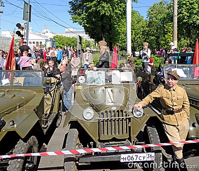 Jeep GAZ-67 and man in the uniform of Polish Army of WWII Editorial Stock Photo
