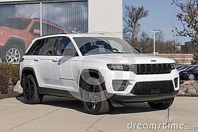 Jeep Grand Cherokee display at a dealership. Jeep offers the Grand Cherokee in Laredo, Limited, and Trailhawk models Editorial Stock Photo