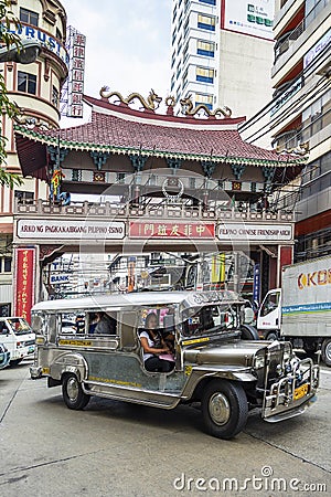 jeepney bus local transport traffic in downtown manila city street philippines Editorial Stock Photo