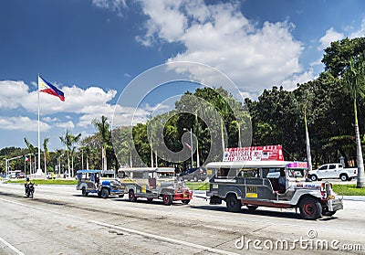 jeepney bus local transport traffic in downtown manila city street philippines Editorial Stock Photo