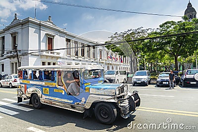 jeepney bus local transport traffic in downtown manila city street philippines Editorial Stock Photo