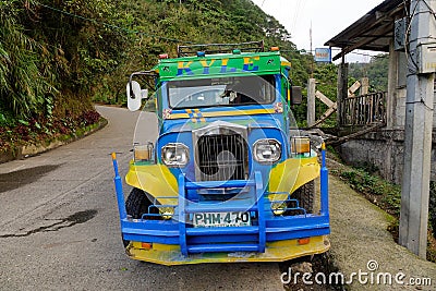 Jeepney car parking on the rural road in Ifugao, Philippines Editorial Stock Photo