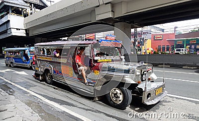 Jeepney on the street in Manila Editorial Stock Photo