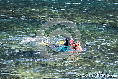 Jeju Island, South Korea - October 15, 2018: Haenyeo Women Diver Show to collect seaweed, shellfish and other seafood at Seongsan Editorial Stock Photo