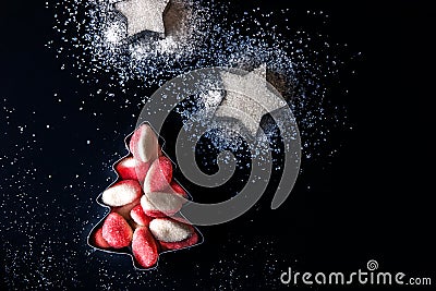 Jelly Christmas tree and sugar stars in the forms for biscuits Stock Photo