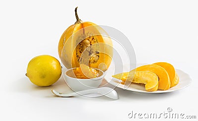 Jelly-glass with a Pumpkin jam and a pumpkin Stock Photo