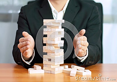 Jenga business game, business fulfillment Building a business base Failed business base Stable and unstable business base. Stock Photo