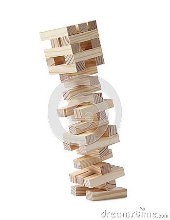 Jenga tower made of wooden blocks falling on white background Stock Photo