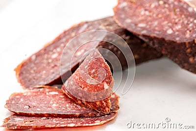 Jerked sausage on a white Stock Photo