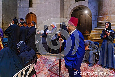 Coptic pray, on Orthodox Good Friday, Holy Sepulchre church Editorial Stock Photo