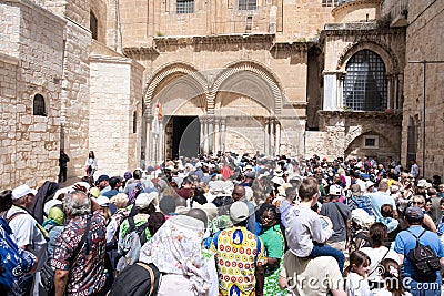 Jerusalem, Israel - 10 April, 2023. Crowd of tourists and pilgrims waiting to enter the church of holy sepulchre at the good Editorial Stock Photo