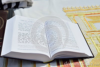JERUSALEM, ISRAEL - APRIL 2017: Talmud Tora Tanach Books lying on table during prayer in Bar Mitzwa Ceremony at the Western Wall Editorial Stock Photo