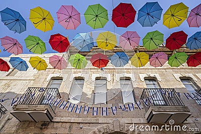 Colorful Umbrellas and Israeli Flags in Jerusalem Editorial Stock Photo