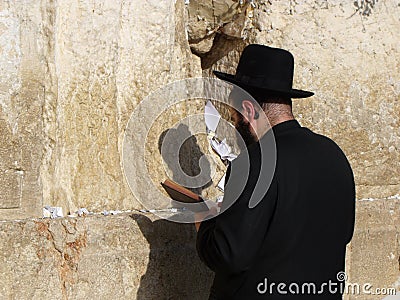 Jewish praying at the Wailing Wall in the city of Jerusalem, Israel Editorial Stock Photo