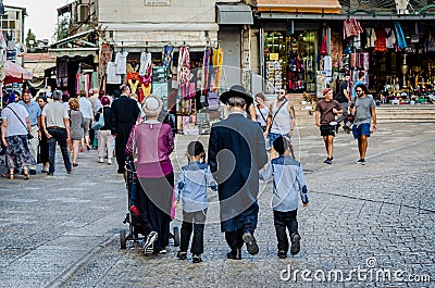 Jerusalem/Israel- August 17, 2016: Orthodox Jewish family at Jaffa Gate in Jerusalem, Israel Editorial Stock Photo