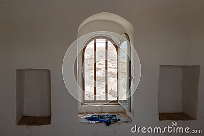 View from the window of the Inner side cell for pilgrims in the Muslim shrine - the complex of the grave of the prophet Moses at Editorial Stock Photo