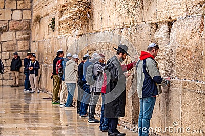 11/23/2018 Jerusalem, Israel, Believing Jews is praying near the wall of crying Editorial Stock Photo