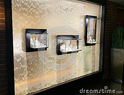 Hall interior of modern hotel with artificial waterfall Editorial Stock Photo