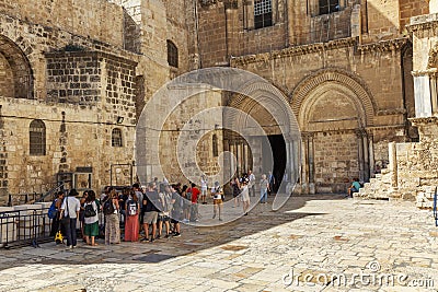 Jerusalem, Israel, 09/11/2016: A group of tourists at the entrance to the temple of the Holy Sepulcher in Jerusalem Editorial Stock Photo