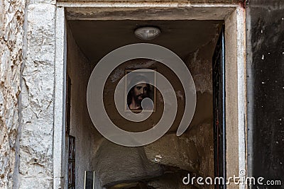 Icon of Jesus Christ at the entrance to the Grotto of Gethsemane on foot of the mountain Mount Eleon - Mount of Olives in East Editorial Stock Photo