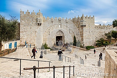 People at the Damascus Gates leading inside the OLd City if Jerusalem in Israel Editorial Stock Photo