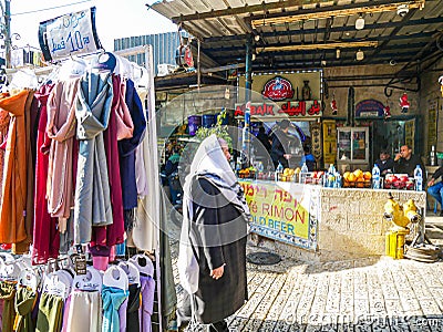 Jerusalem, old city market. Crowd and goodes. Editorial Stock Photo