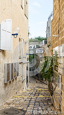 Jerusalem white stone house on narrow street of Old Yafo Jaffa. Tel Aviv, Israel. Editorial Stock Photo