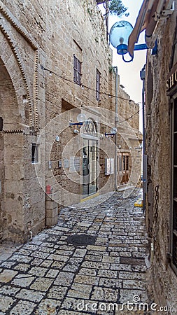 Jerusalem white stone house on narrow street of Old Yafo Jaffa. Tel Aviv, Israel. Stock Photo