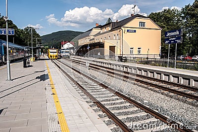 Jesenik railway station with railway station building, track, trains and platform in Czech republic Editorial Stock Photo