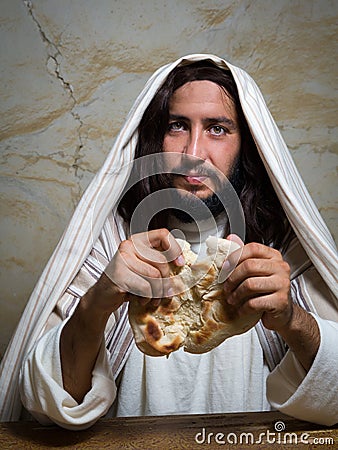 Jesus breaking the bread Stock Photo